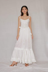 Sleeveless organza midi dress with tassel tie straps and gathered hemline detail